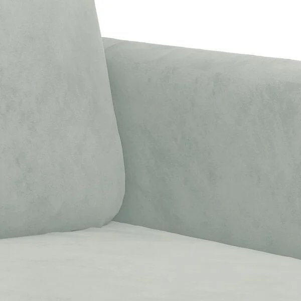 Svetainės interjeras su šviesiai pilka aksomine sofa